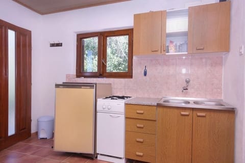 Fridge, stovetop, dishwasher, dining tables