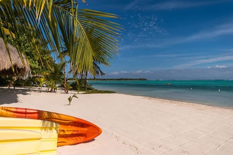 On the beach, sun loungers, beach towels