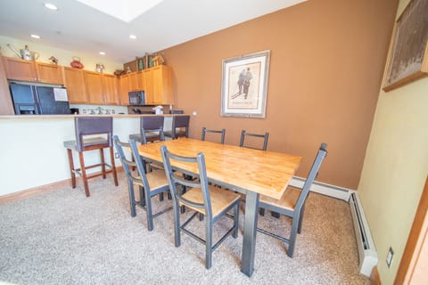 Dining table and barstool seating