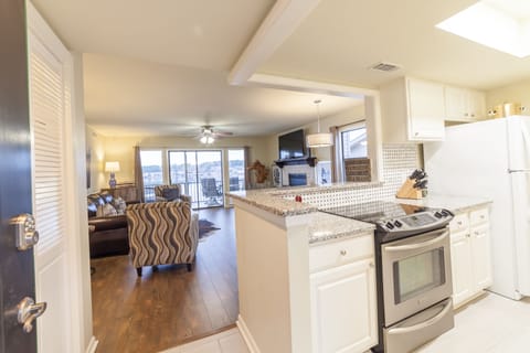 Walking in the front door, you're greeted with the open kitchen and living room.