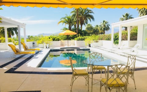 View of Pool and Deck from Living Room.