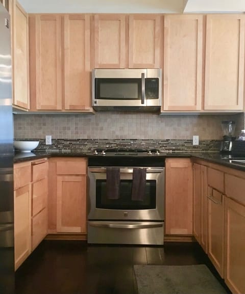 Updated kitchen with full size appliances and gas stove/range
