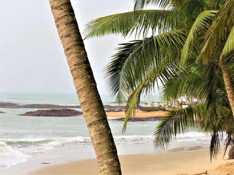 On the beach, sun loungers, beach towels