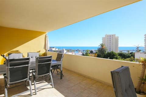 Terrace with outdoor dining area for six guests and stunning sea views