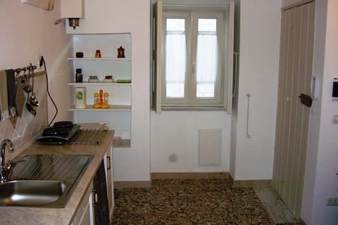 Fridge, stovetop, coffee/tea maker, highchair