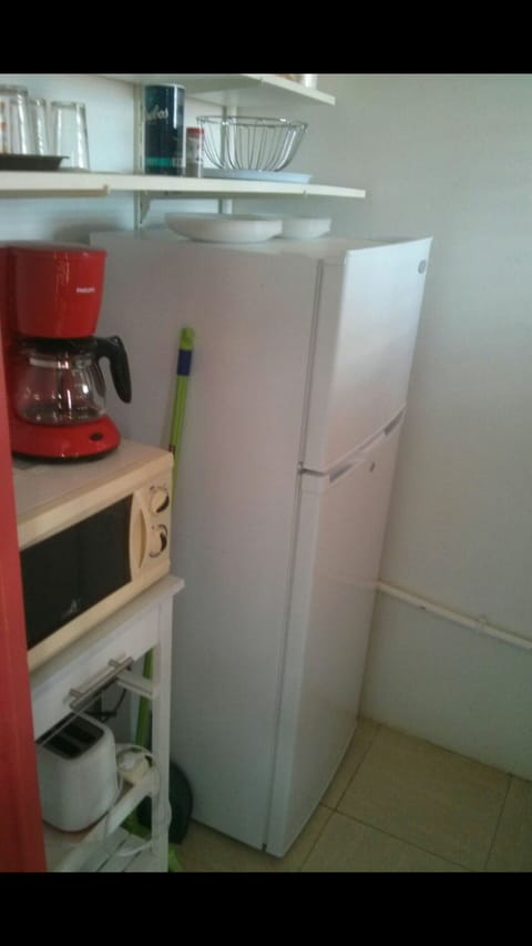 Fridge, microwave, coffee/tea maker, toaster