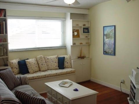 Den with flat screen tv, Bose surround sound, DVD & music library