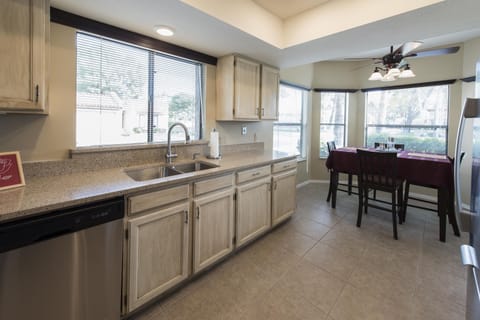 KITCHEN AND DINING AREA.