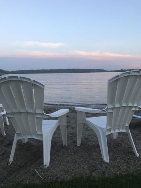 On the beach, sun loungers, beach towels