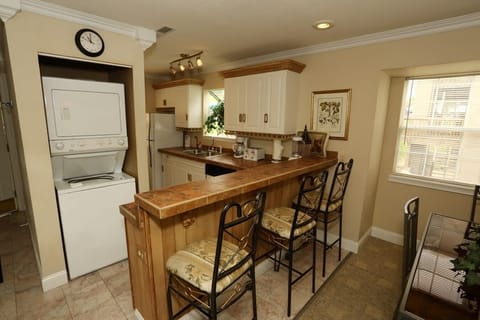 Kitchen island offers seating for 3.