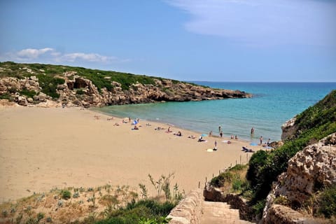 On the beach, sun loungers