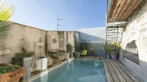 A rooftop pool, a heated pool