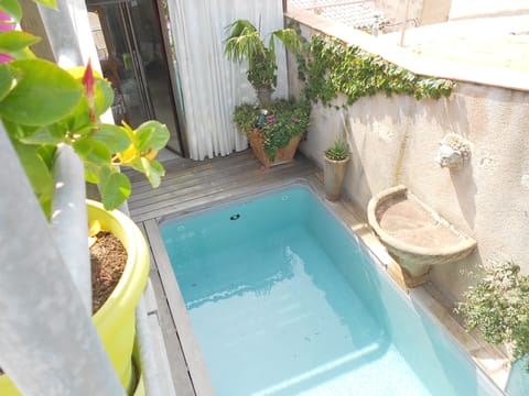 A rooftop pool, a heated pool