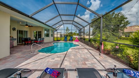 Outdoor pool, a heated pool, sun loungers