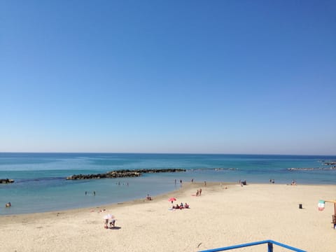 On the beach, sun loungers