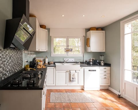 Large fully equipped modern kitchen with access to front terrace area