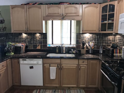 Kitchen with dishwasher and deep sink
