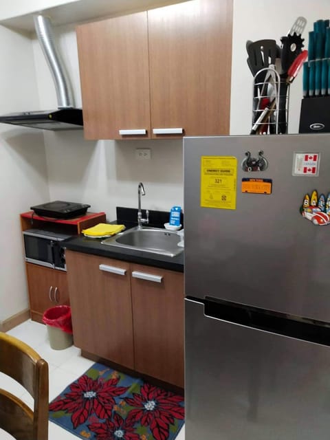 Fridge, microwave, toaster, cookware/dishes/utensils