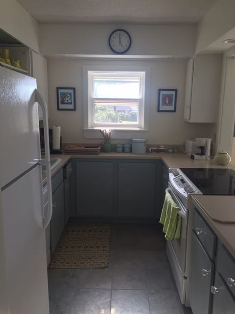 Fridge, stovetop, dishwasher, dining tables