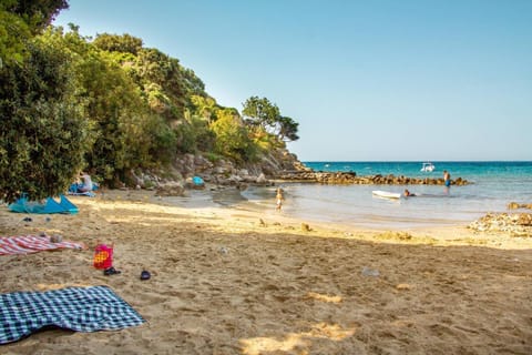 On the beach, sun loungers