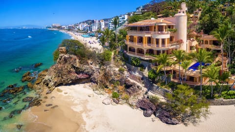 On the beach, sun loungers, beach towels