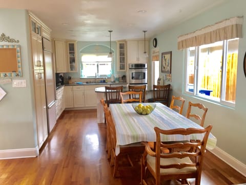 View of Kitchen/Dining Area from Living Room, Open Floor Plan, Hardwood Floors 
