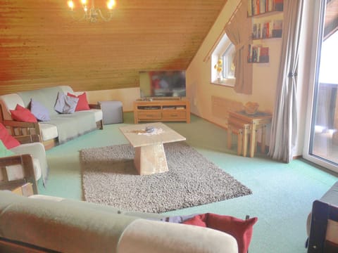 Spacious living room with balcony access