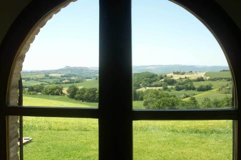 he studio windows have a wonderful view across the fields to Todi on its hill