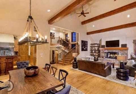 The stairs at the end lead to the Main Master Bedroom and to the other floors