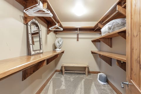 Large, walk in first master bedroom closet.