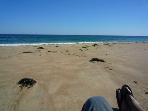 On the beach, sun loungers