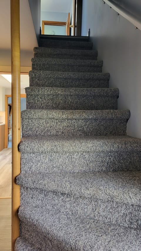 Back stairwell to east and middle bedrooms