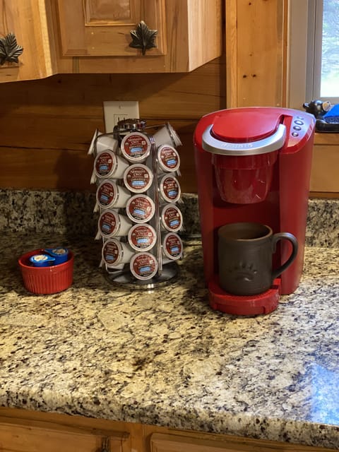 Keurig with organic Newman’s Own coffee and creamers provided for our guests