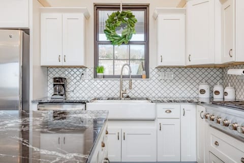 Farmhouse sink, dishwasher, coffee pot and all the pans and silverware you need!