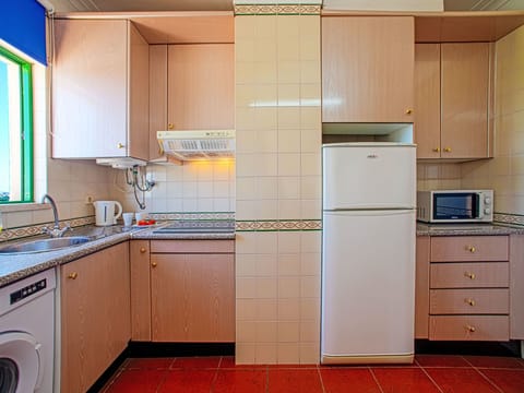 Fridge, microwave, cookware/dishes/utensils