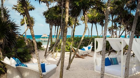 On the beach, sun loungers, beach towels