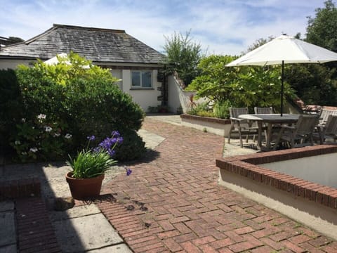 West facing patio with games room