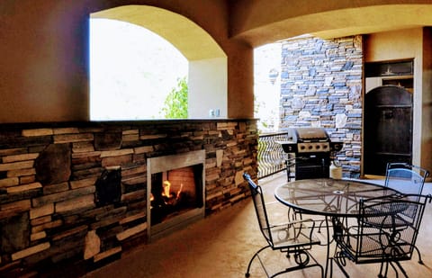 Private patio with fireplace