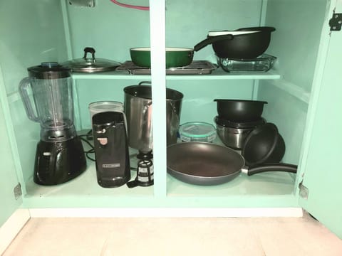 Lightly Stocked with Pots, Pans, Mixing
Bowls, Blender, Can Opener....