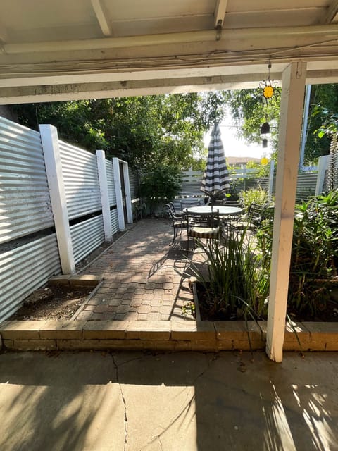 Front outdoor patio with charcoal bbq