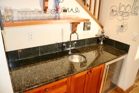 Wet bar and wine refrigerator on main floor