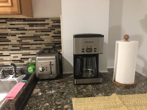 Fridge, microwave, coffee/tea maker, toaster