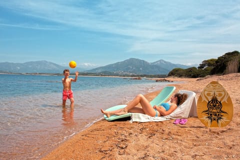 On the beach, sun loungers