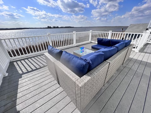 Enjoy the view from the large back deck and new outdoor sectional! 