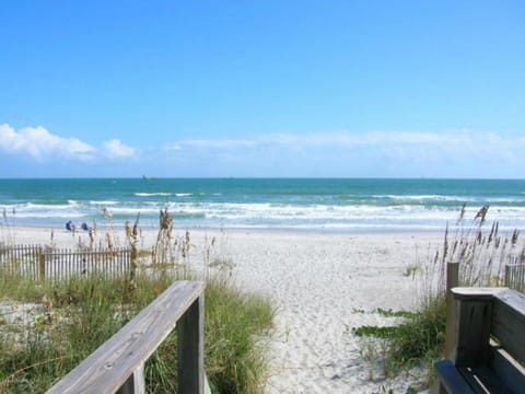 On the beach, sun loungers, beach towels