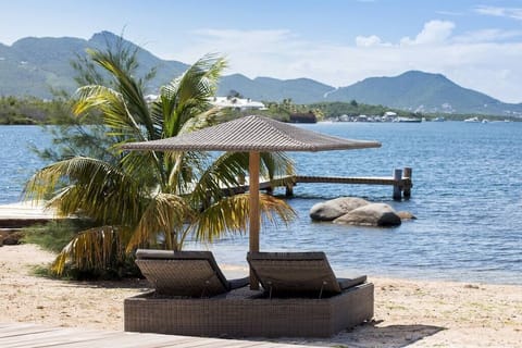 On the beach, sun loungers, beach towels