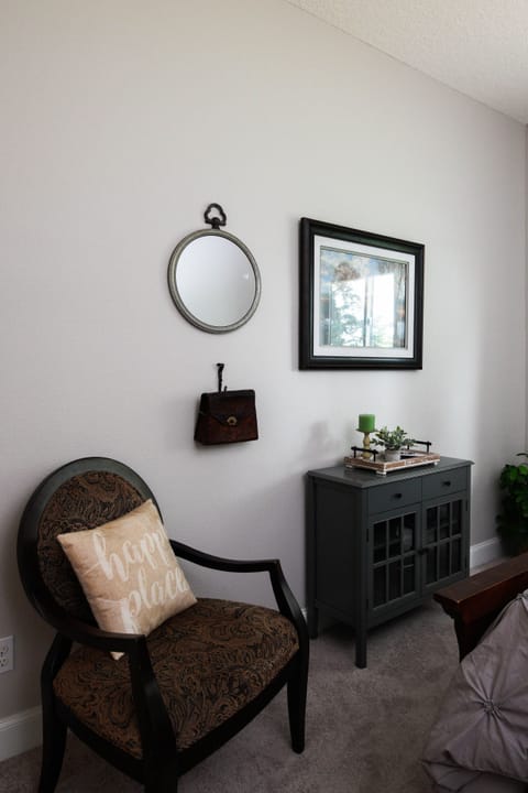 Comfortable seating area and equestrian touches.