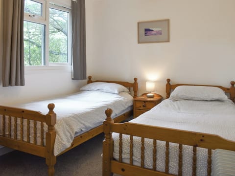 Comfortable twin bedroom | Chalet 1 - Mount Hawke Holiday Bungalows, Mount Hawke, near Redruth