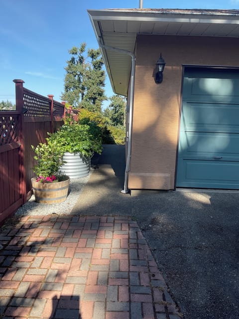 Paved side walkway from guest parking to your private suite entrance