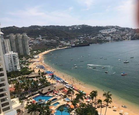 On the beach, sun loungers, beach towels